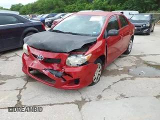 2009 Toyota Corolla with VIN 1NXBU40E89Z158636, listed as a IAAI auction lot 42142036 with 181,943 mi miles. Bid and sale history available at carsss.com. Image 2.