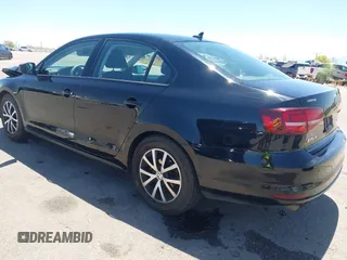 2016 Volkswagen Jetta Sedan 1.4T SE with VIN 3VWD67AJ8GM368642, listed as a IAAI auction lot 42087079 with 90,974 mi miles. Bid and sale history available at carsss.com. Image 3.