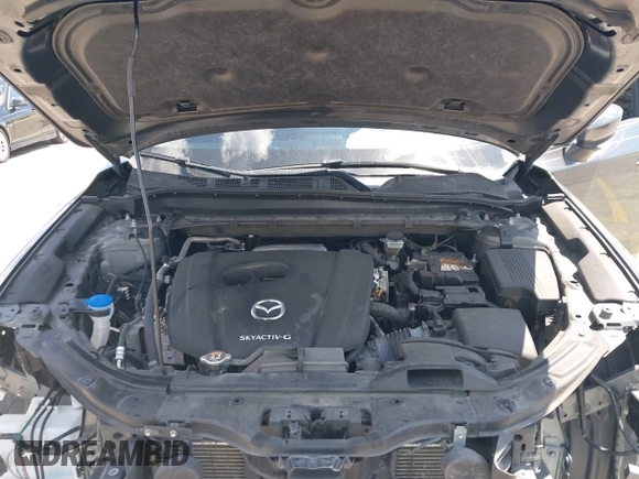 2020 Mazda CX-5 Touring with VIN JM3KFACM9L0826742, listed as a IAAI auction lot 41903755 with 73,409 mi miles and . Bid and sale history available at DreamBid. Image 10.