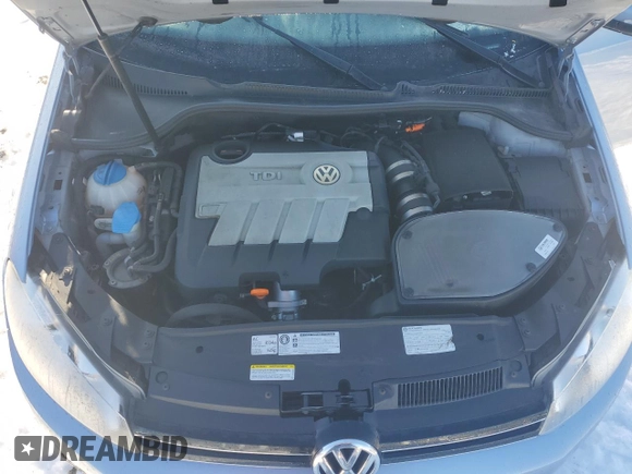 2012 Volkswagen Golf TDI z VIN WVWNM7AJXCW215994, wystawiony jako Copart lot #62693075 z przebiegiem 122 234 mil mil oraz Nie do naprawy • Non repairable. Historia ofert i sprzedaży dostępna na DreamBid. Obrazek 12.