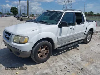 2002 Ford Explorer Sport Trac Value z VIN 1FMZU77E22UD24886, wystawiony jako IAAI lot #42361154 z przebiegiem 240 972 mil mil oraz . Historia ofert i sprzedaży dostępna na DreamBid. Obrazek 2.