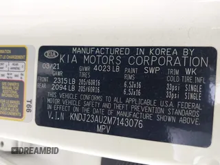 2021 Kia Soul S with VIN KNDJ23AU2M7143076, listed as a IAAI auction lot 41737738 with 57,990 mi miles and . Bid and sale history available at DreamBid. Image 9.