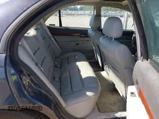 2000 Cadillac Catera z VIN W06VR54R3YR029454, wystawiony jako IAAI lot #42371242 z przebiegiem 166 182 mil mil oraz . Historia ofert i sprzedaży dostępna na DreamBid. Obrazek 8.