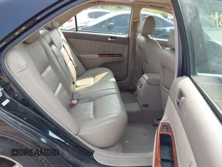 2003 Toyota Camry LE z VIN 4T1BE30KX3U197331, wystawiony jako IAAI lot #42298164 z przebiegiem 248 008 mil mil oraz . Historia ofert i sprzedaży dostępna na DreamBid. Obrazek 8.