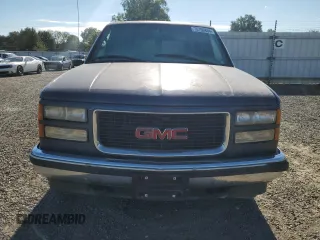 1999 GMC Yukon with VIN 1GKEK13R3XJ757466, listed as a Copart auction lot 75750884 with 270,768 mi miles and Salvage Title. Bid and sale history available at carsss.com. Image 5.