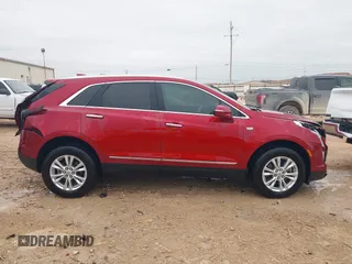 2023 Cadillac XT5 FWD Luxury z VIN 1GYKNAR42PZ147121, wystawiony jako IAAI lot #41315848 z przebiegiem 10 444 mil mil oraz . Historia ofert i sprzedaży dostępna na DreamBid. Obrazek 13.