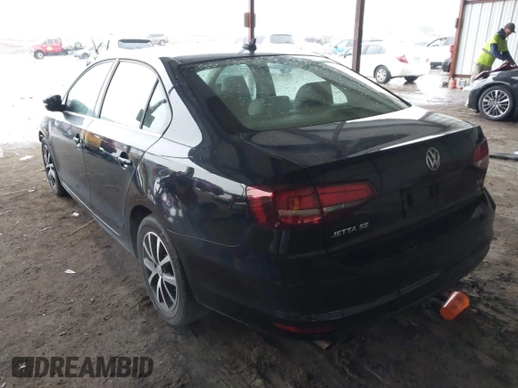 2018 Volkswagen Jetta SE with VIN 3VWDB7AJ3JM214858, listed as a IAAI auction lot 42151137 with 100,346 mi miles and . Bid and sale history available at DreamBid. Image 3.