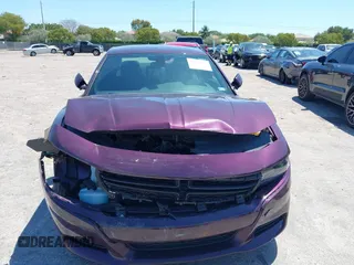 2020 Dodge Charger SXT with VIN 2C3CDXBG5LH220064, listed as a IAAI auction lot 42028723 with 25,140 mi miles and . Bid and sale history available at carsss.com. Image 6.