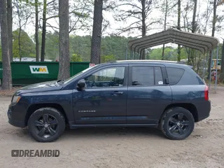 2014 Jeep Compass Sport with VIN 1C4NJDBB5ED776679, listed as a IAAI auction lot 41992146 with 145,706 mi miles. Bid and sale history available at carsss.com. Image 14.