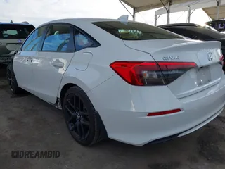 2022 Honda Civic Sport z VIN 2HGFE2F5XNH606629, wystawiony jako IAAI lot #41695647 z przebiegiem 58 128 mil mil oraz . Historia ofert i sprzedaży dostępna na DreamBid. Obrazek 3.