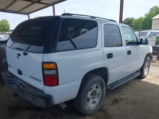 2004 Chevrolet Tahoe LS with VIN 1GNEC13V24J290596, listed as a IAAI auction lot 41956638 with 199,004 mi miles. Bid and sale history available at carsss.com. Image 4.