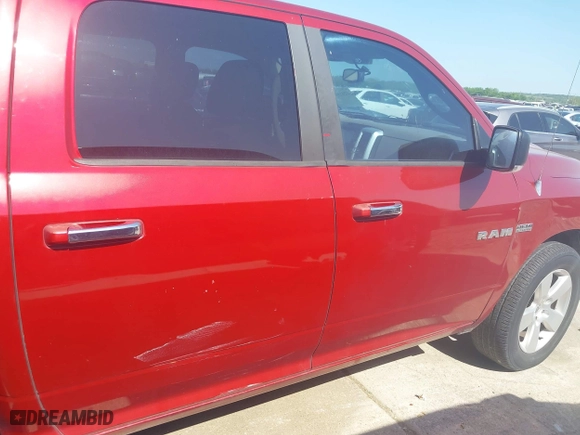 2009 Dodge Ram 1500 Laramie with VIN 1D3HB13T29J501785, listed as a IAAI auction lot 42010637 with 172,926 mi miles. Bid and sale history available at carsss.com. Image 13.