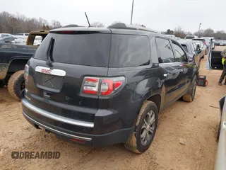 2014 GMC Acadia SLT with VIN 1GKKRRKD8EJ328145, listed as a IAAI auction lot 41376965 with 128,711 mi miles. Bid and sale history available at carsss.com. Image 4.