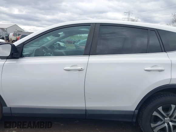 2018 Toyota RAV4 LE with VIN 2T3BFREVXJW793174, listed as a IAAI auction lot 42037936 with 82,304 mi miles. Bid and sale history available at carsss.com. Image 14.