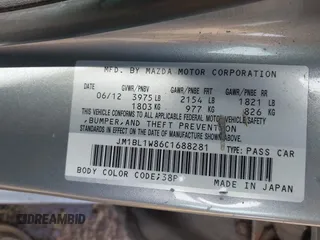 2012 Mazda 3 i Grand Touring with VIN JM1BL1W86C1688281, listed as a IAAI auction lot 41643298 with 266,291 mi miles and . Bid and sale history available at DreamBid. Image 9.