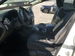 2016 Nissan Rogue SV with VIN KNMAT2MT1GP694405, listed as a Copart auction lot 45216675 with 0 mi miles and Salvage Title. Bid and sale history available at carsss.com. Image 7.