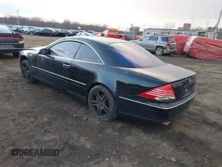 2005 Mercedes-Benz CL-Class 5.0L with VIN WDBPJ75J65A046793, listed as a IAAI auction lot 41187953 with 128,627 mi miles. Bid and sale history available at carsss.com. Image 3.