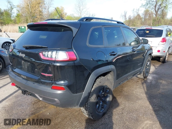 2022 Jeep Cherokee Trailhawk with VIN 1C4PJMBX1ND533715, listed as a IAAI auction lot 42041057 with 65,487 mi miles and . Bid and sale history available at DreamBid. Image 4.