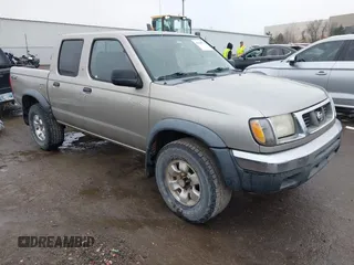 2000 Nissan Frontier XE z VIN 1N6ED27Y9YC414533, wystawiony jako IAAI lot #41450977 z przebiegiem 197 271 mil mil oraz . Historia ofert i sprzedaży dostępna na DreamBid. Obrazek 1.