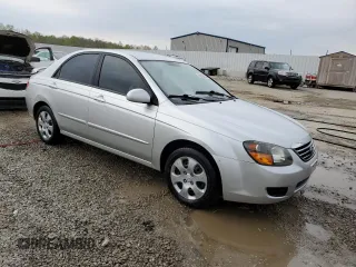 2009 Kia Spectra EX with VIN KNAFE221595657550, listed as a Copart auction lot 52805205 with 95,777 mi miles and Salvage Title. Bid and sale history available at DreamBid. Image 4.