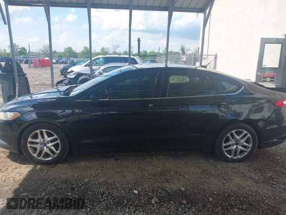 2013 Ford Fusion SE z VIN 3FA6P0H74DR121844, wystawiony jako IAAI lot #42192590 z przebiegiem 243 433 mil mil oraz . Historia ofert i sprzedaży dostępna na DreamBid. Obrazek 14.