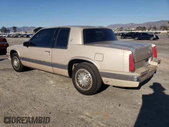 1988 Cadillac Eldorado with VIN 1G6EL1153JU612185, listed as a Copart auction lot 83786144 with 133,882 mi miles and Salvage Title. Bid and sale history available at DreamBid. Image 2.