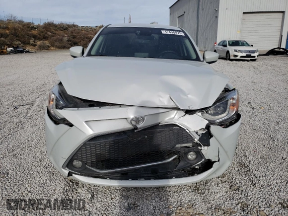 2019 Toyota Yaris L z VIN 3MYDLBYV3KY506033, wystawiony jako Copart lot #47498075 z przebiegiem 71 326 mil mil oraz Szkoda całkowita • Salvage title. Historia ofert i sprzedaży dostępna na DreamBid. Obrazek 5.