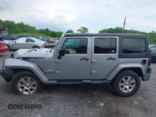 2014 Jeep Wrangler Unlimited Sahara z VIN 1C4BJWEG0EL129229, wystawiony jako IAAI lot #42380976 z przebiegiem 175 735 mil mil oraz . Historia ofert i sprzedaży dostępna na DreamBid. Obrazek 14.