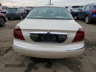 2001 Lincoln Continental with VIN 1LNHM97V11Y681989, listed as a Copart auction lot 46539725 with 107,130 mi miles and Salvage Title. Bid and sale history available at DreamBid. Image 6.