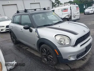 2012 MINI Countryman S with VIN WMWZC5C5XCWL55727, listed as a IAAI auction lot 42704959 with 104,000 mi miles and . Bid and sale history available at DreamBid. Image 1.