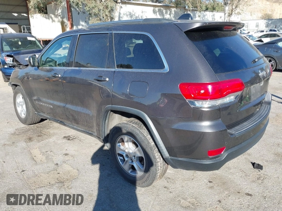 2017 Jeep Grand Cherokee Laredo with VIN 1C4RJEAG8HC944037, listed as a IAAI auction lot 41299619 with 140,405 mi miles. Bid and sale history available at carsss.com. Image 3.