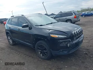 2014 Jeep Cherokee Latitude with VIN 1C4PJMCS0EW208092, listed as a IAAI auction lot 42174675 with 202,871 mi miles and . Bid and sale history available at carsss.com. Image 1.