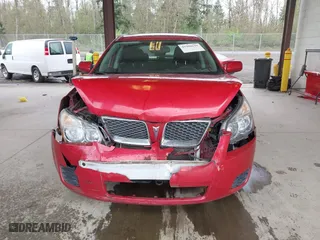 2009 Pontiac Vibe w/1SA with VIN 5Y2SP67859Z430411, listed as a IAAI auction lot 41980141 with 140,676 mi miles. Bid and sale history available at carsss.com. Image 12.