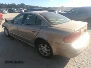 2004 Oldsmobile Alero GL1 z VIN 1G3NL52E54C184505, wystawiony jako IAAI lot #40561842 z przebiegiem 21 779 mil mil oraz . Historia ofert i sprzedaży dostępna na DreamBid. Obrazek 3.