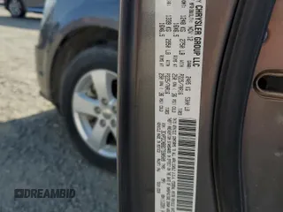 2013 Dodge Journey American Value with VIN 3C4PDCAB8DT590509, listed as a Copart auction lot 57347375 with 203,642 mi miles and Clean title. Bid and sale history available at DreamBid. Image 13.