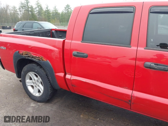 2011 Ram Dakota Bighorn/Lonestar with VIN 1D7RW3GK4BS549700, listed as a IAAI auction lot 42176692 with 167,832 mi miles. Bid and sale history available at carsss.com. Image 12.