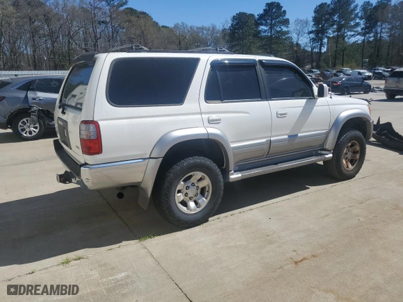 1998 Toyota 4Runner with VIN JT3GN87R6W0082865, listed as a Copart auction lot 49490015 with 411,722 mi miles and Salvage Title. Bid and sale history available at carsss.com. Image 3.