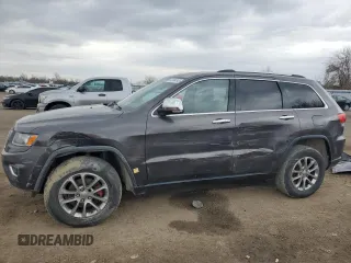 2014 Jeep Grand Cherokee Limited z VIN 1C4RJFBG2EC543342, wystawiony jako Copart lot #52494145 z przebiegiem 225 686 mil mil oraz Czysty tytuł • Clean title. Historia ofert i sprzedaży dostępna na DreamBid. Obrazek 1.