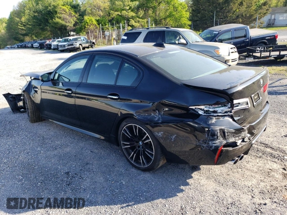 2018 BMW M5 z VIN WBSJF0C5XJB282107, wystawiony jako Copart lot #49979943 z przebiegiem 55 243 mil mil oraz . Historia ofert i sprzedaży dostępna na DreamBid. Obrazek 2.