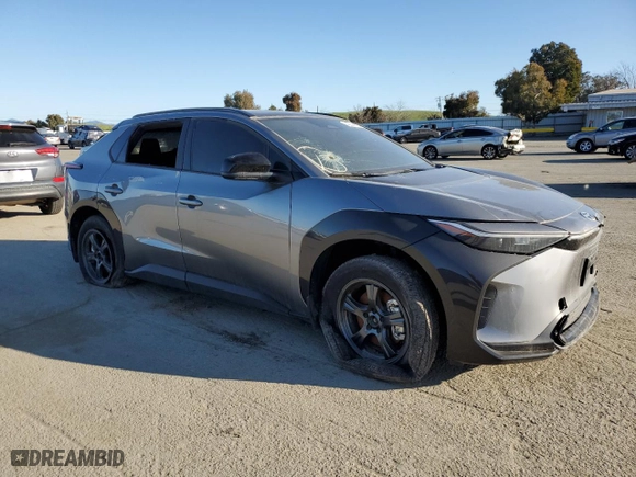 2024 Toyota bZ4X XLE with VIN JTMABACA4RA054871, listed as a Copart auction lot 43635915 with 3,206 mi miles and Salvage Title. Bid and sale history available at carsss.com. Image 4.