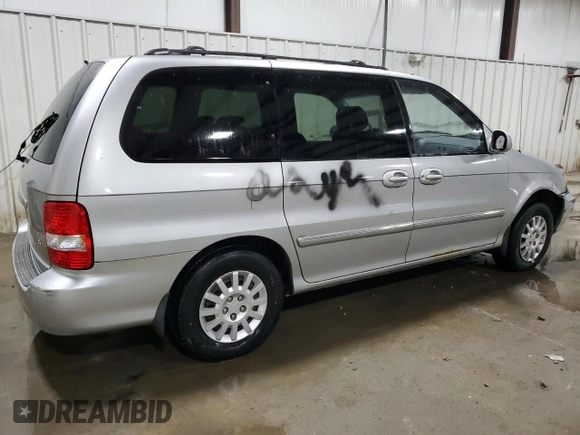 2003 Kia Sedona LX with VIN KNDUP131736467120, listed as a Copart auction lot 61992234 with 133,222 mi miles and Salvage Title. Bid and sale history available at carsss.com. Image 3.