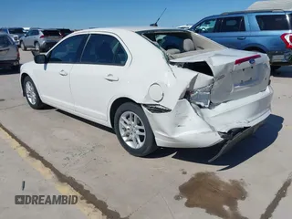 2012 Ford Fusion S with VIN 3FAHP0GA0CR137074, listed as a IAAI auction lot 41756162 with 165,205 mi miles. Bid and sale history available at carsss.com. Image 3.