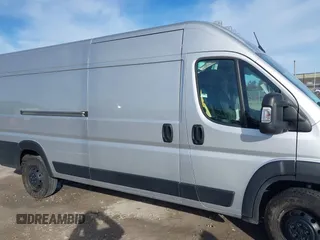2023 Ram ProMaster Cargo with VIN 3C6MRVJG5PE501250, listed as a IAAI auction lot 40670587 with 97,369 mi miles and . Bid and sale history available at DreamBid. Image 13.