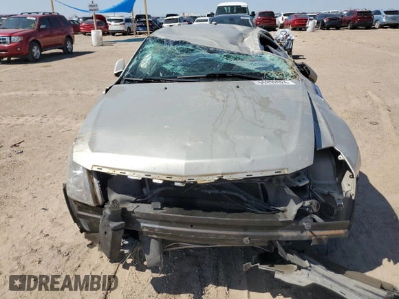 2013 Cadillac CTS Performance with VIN 1G6DC1E35D013318V, listed as a Copart auction lot 66292624 with 123,990 mi miles and Salvage title. Bid and sale history available at DreamBid. Image 5.