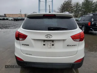 2013 Hyundai Tucson GLS with VIN KM8JU3AC0DU770079, listed as a Copart auction lot 52639835 with 212,894 mi miles and Clean Title. Bid and sale history available at carsss.com. Image 6.