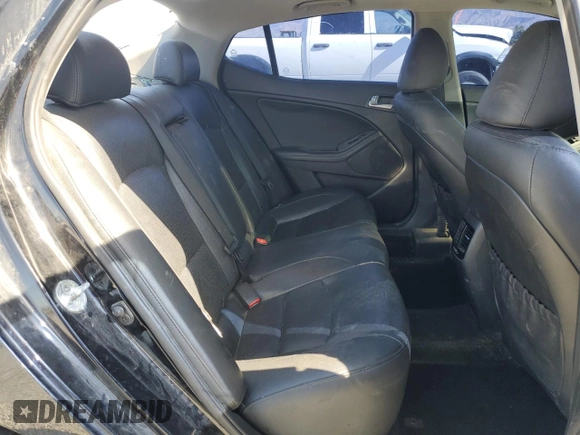 2015 Kia Optima SX Turbo with VIN 5XXGR4A6XFG454049, listed as a Copart auction lot 52217185 with 115,675 mi miles and Salvage Title. Bid and sale history available at carsss.com. Image 10.