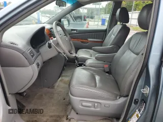 2009 Toyota Sienna XLE z VIN 5TDZK22C09S252216, wystawiony jako Copart lot #57690045 z przebiegiem 132 012 mil mil oraz Nie do naprawy • Non repairable. Historia ofert i sprzedaży dostępna na DreamBid. Obrazek 7.