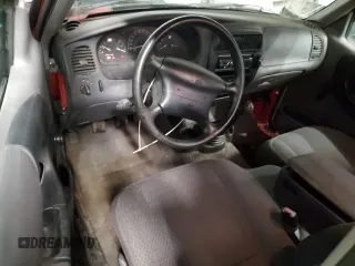 1999 Ford Ranger XL with VIN 1FTYR10C7XPB67854, listed as a Copart auction lot 86255294 with 169,102 mi miles and Salvage title. Bid and sale history available at DreamBid. Image 8.