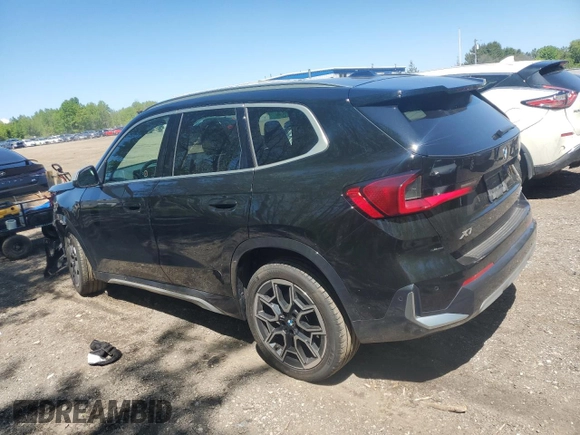 2023 BMW X1 xDrive28i with VIN WBX73EF04P5X86962, listed as a Copart auction lot 57575815 with 95,965 mi miles and Salvage title. Bid and sale history available at DreamBid. Image 2.