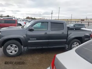 2009 Toyota Tacoma z VIN 3TMLU42N09M034743, wystawiony jako IAAI lot #41467696 z przebiegiem 129 395 mil mil oraz . Historia ofert i sprzedaży dostępna na DreamBid. Obrazek 14.